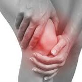 A person holding their knee with pain